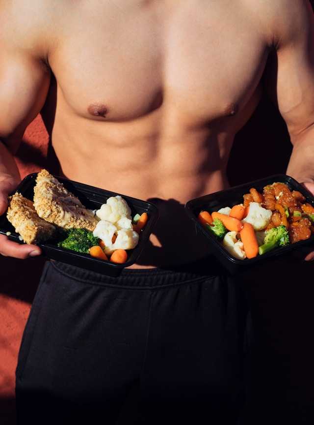 Fit man holding healthy food