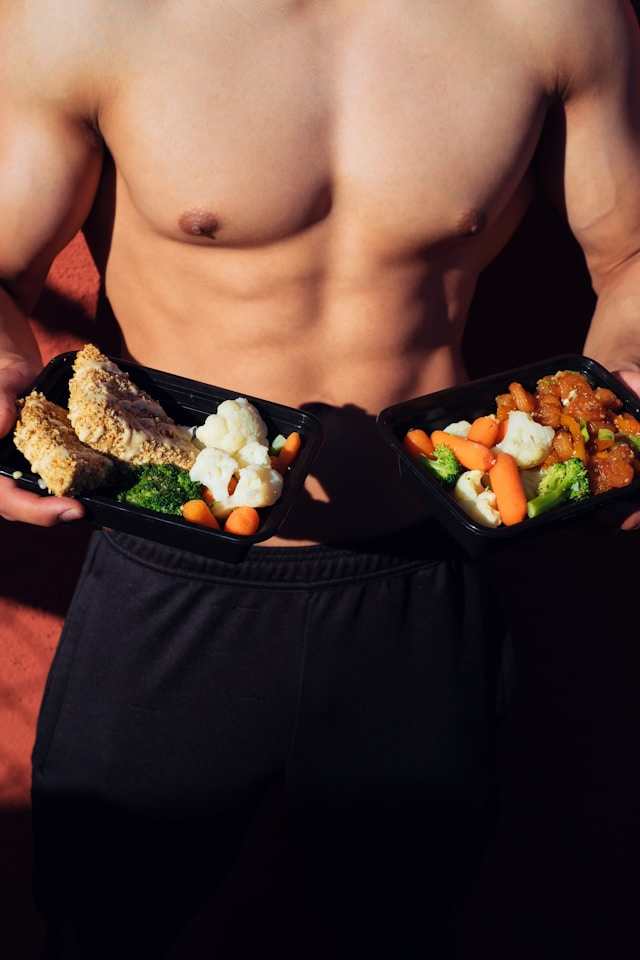 Fit Man holding healthy food